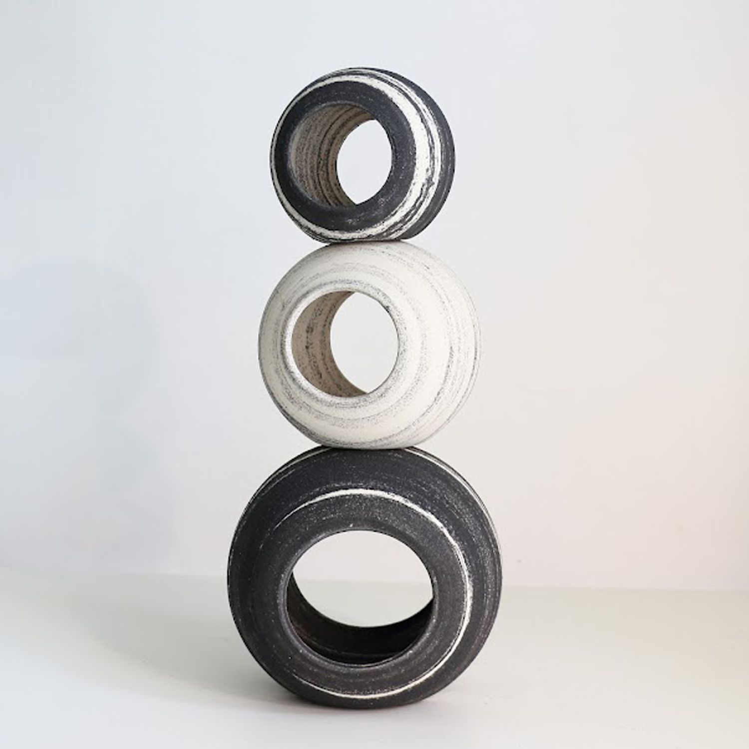 Celina Kang: Stacked C – Three Rings Product Image 1 of 1