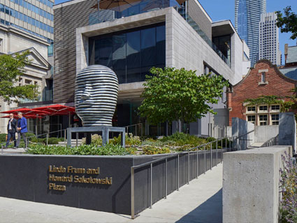 View of the front of the Gardiner Museum with the accessibility ramp in the foreground