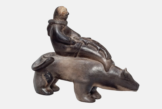 Contemporary-1 Inuit ceramic sculpture of Sedna riding a bear