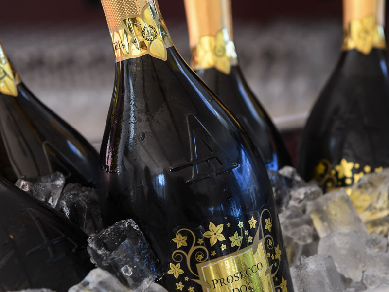 Bottles of prosecco in an ice bucket
