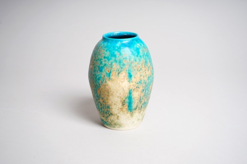 Turqouis and tan ceramic vase