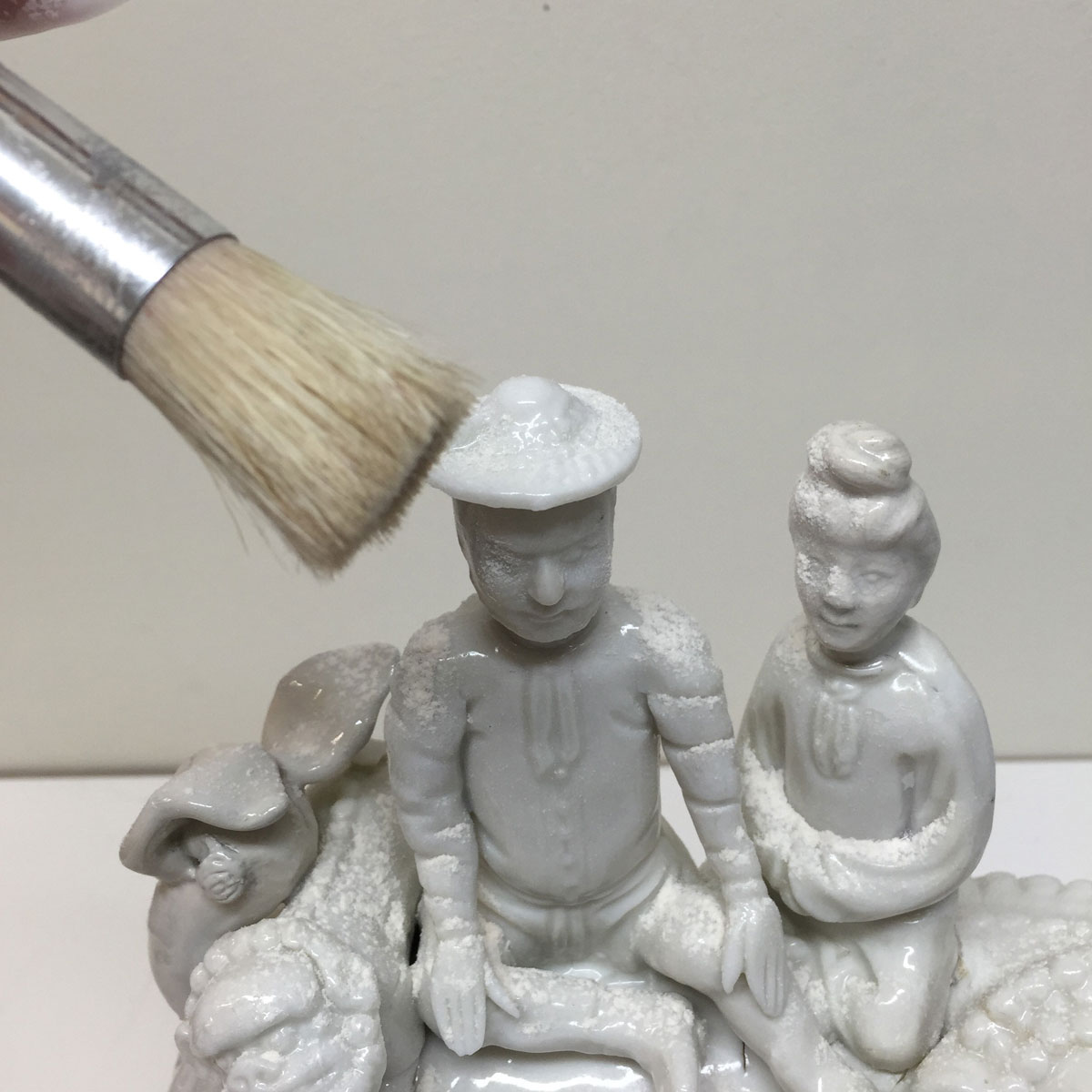 Grouping of white porcelain figures