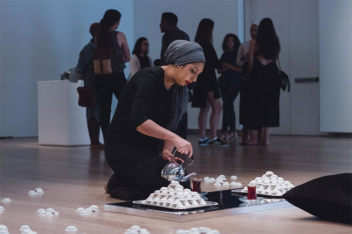 Artist Habiba El Sayed performing at the Gardiner Museum
