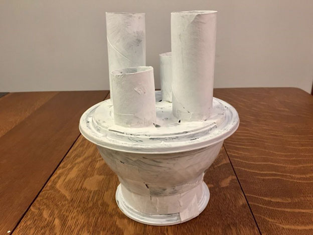 White homemade bowl with spouts