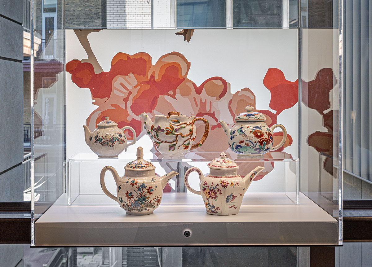 Glass vitrines filled with porcelain objects