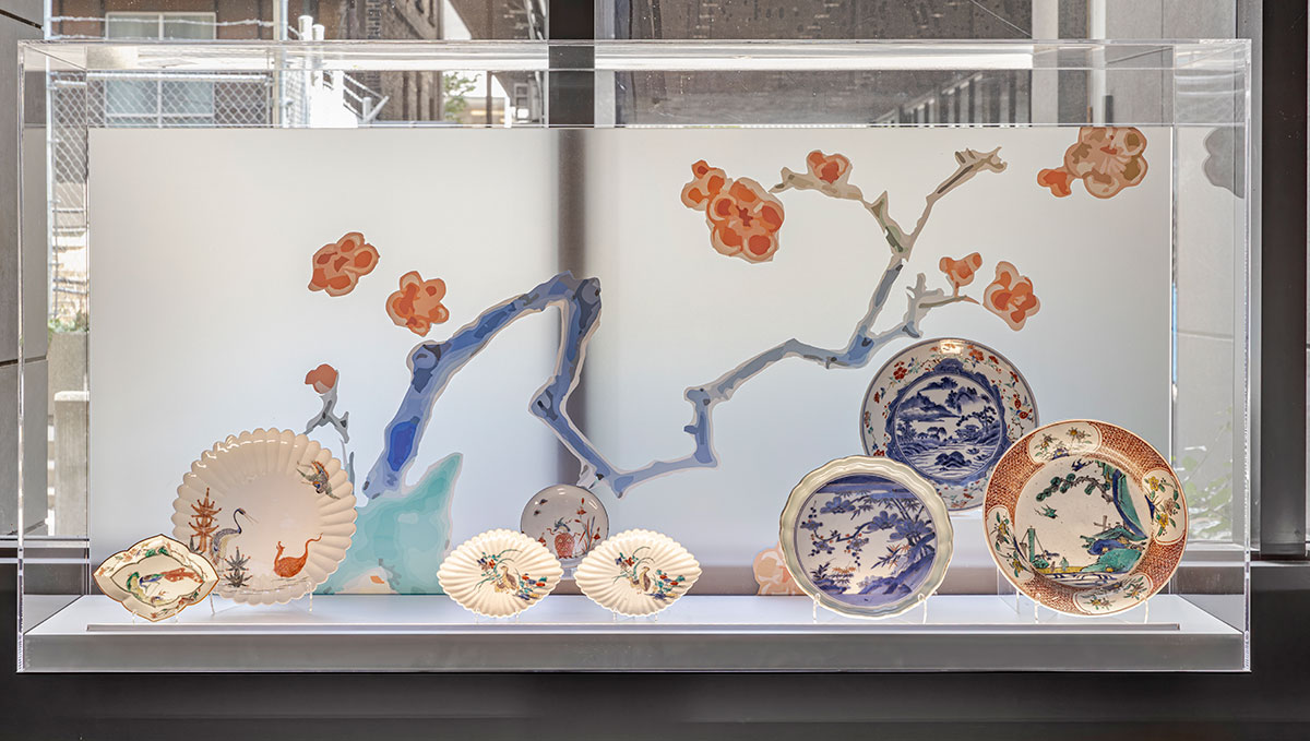 Glass vitrines filled with porcelain objects