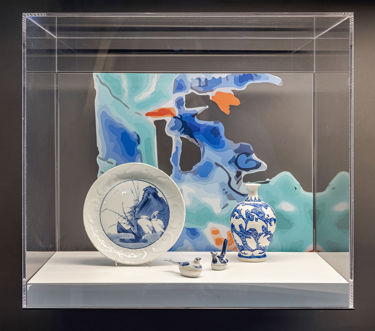 Glass vitrines filled with porcelain objects