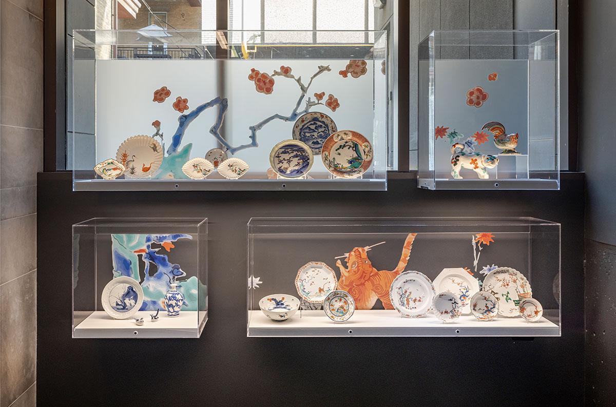 Glass vitrines filled with porcelain objects