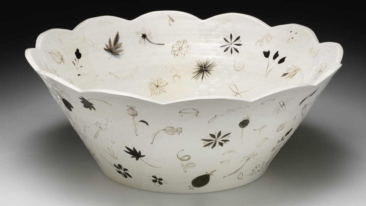 Ceramic bowl with scalloped edges