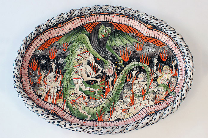 Charger with the image of a woman-dragon hybrid 