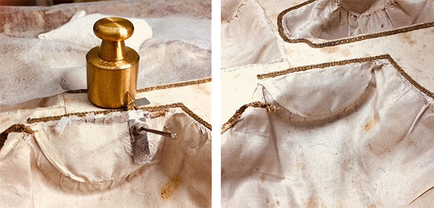 Repair of the fabric tears on the presentation case in progress