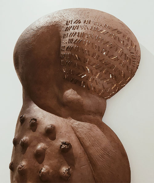 Abstract sculpture of a body with scarification