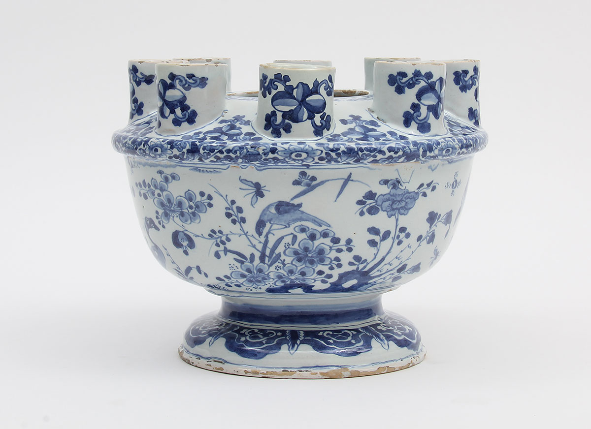 Blue and white ceramic bowl with multiple spouts