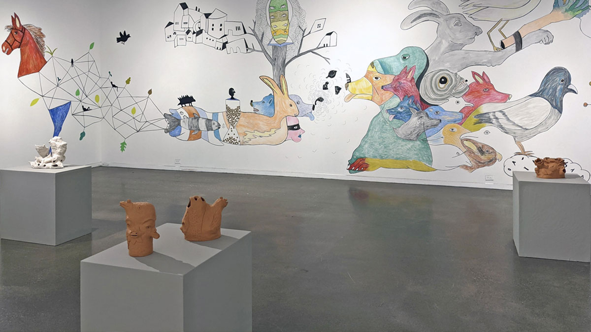 Wall mural and ceramic objects on plinths